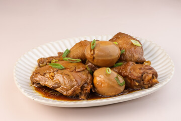 Chicken Adobo with Eggs is a Filipino Dish Stew in Soy Sauce.
