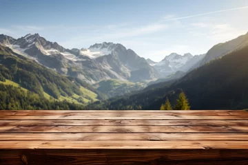 Fotobehang Wooden table on the background of blurry Mountain,winter theme ,product mockup and backdrop © Sara_P