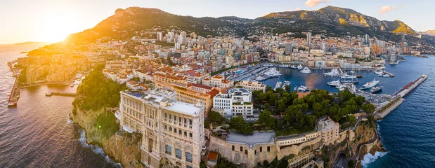 Fotobehang Sunset view of oceanographic museum in Monaco, a sovereign city-state on the French Riviera, in Western Europe, on the Mediterranean Sea © alexey_fedoren