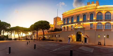 Sunset view of Prince's Palace in Monaco, a sovereign city-state on the French Riviera, in Western Europe, on the Mediterranean Sea - obrazy, fototapety, plakaty