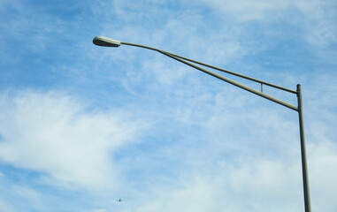 city street with traffic lights illuminating the night, bustling with urban energy and motion blur