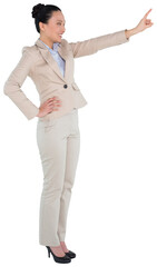 Digital png photo of happy asian businesswoman pointing on transparent background