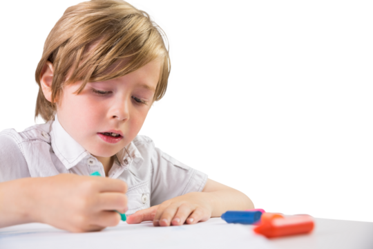 Digital png photo of caucasian schoolboy drawing on transparent background