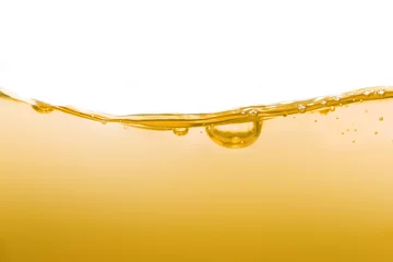 Fotobehang Appearance surface poured brownish yellow lubricant liquid for bubbles background can use cooking oil.  © watchara