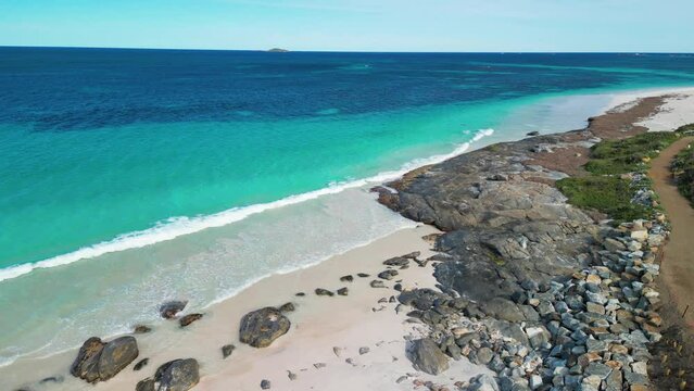 Descend on Cape Leeuwin coastline in Australia with luxury empty beach and turquoise Indian ocean water