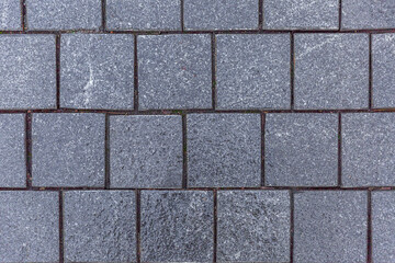 Gray paving slabs. City design and architecture. Top view. Background. Space for text.