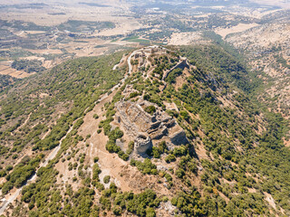 Fototapeta na wymiar Drone view of remains of the all medieval fortress of Nimrod - Qalaat al-Subeiba, located near the border with Syria and Lebanon on the Golan Heights, in northern Israel