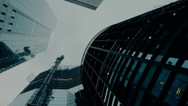 A dramatic perspective of important skyscrapers in the financial center of the City of London, England, UK graded in high contrast