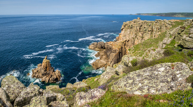 The old coastguard lookout on Pedn-Men-Du cliff and the Irish Lady sea stack, Sennen Cove, Cornwall, from the S W Coast Path.