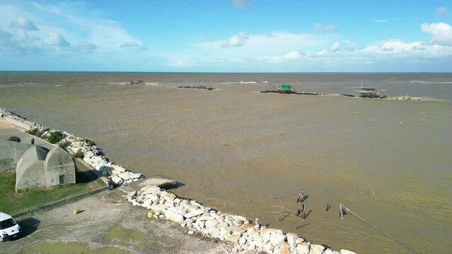 Aerial view of the aftermath of storm Ciaran hit Marina di Pisa harbour Tuscany, Italy
