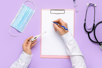 Doctor with thermometer writing in clipboard on lilac background, top view