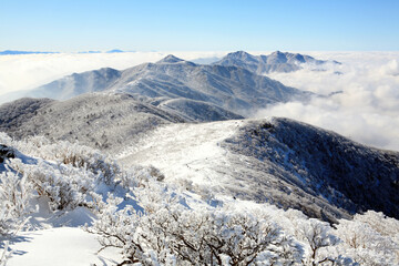 Fototapeta na wymiar a winter mountain with clouds