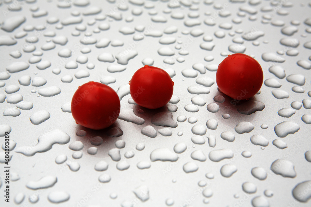 Canvas Prints raindrops on the bonnet and cherry tomato