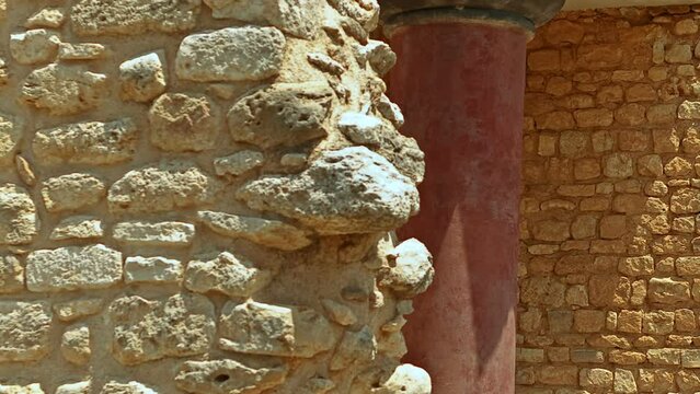Tracking shot of a temple and fresco within the complex of the Minoan Palace of Knossos, Heraklion, Crete, Greece