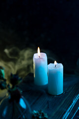 Burning candles on the table