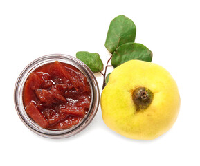 Jar of sweet jam and quince fruit on white background