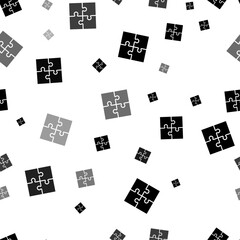 Seamless vector pattern with puzzle symbols, creating a creative monochrome background with rotated elements. Vector illustration on white background