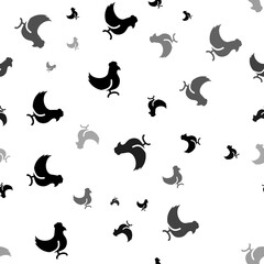 Seamless vector pattern with chicken symbols, creating a creative monochrome background with rotated elements. Illustration on transparent background