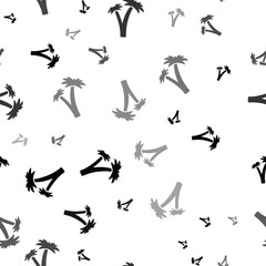 Seamless vector pattern with palm trees symbols, creating a creative monochrome background with rotated elements. Illustration on transparent background