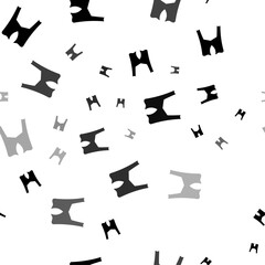 Seamless vector pattern with women's jacket symbols, creating a creative monochrome background with rotated elements. Vector illustration on white background