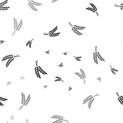 Seamless vector pattern with wheat symbols, creating a creative monochrome background with rotated elements. Vector illustration on white background