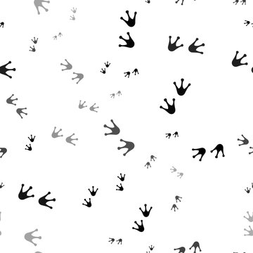 Seamless vector pattern with frog tracks symbols, creating a creative monochrome background with rotated elements. Vector illustration on white background