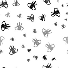 Seamless vector pattern with elephant heads, creating a creative monochrome background with rotated elements. Illustration on transparent background