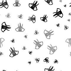 Seamless vector pattern with elephant heads, creating a creative monochrome background with rotated elements. Vector illustration on white background