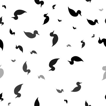Seamless vector pattern with duck symbols, creating a creative monochrome background with rotated elements. Illustration on transparent background