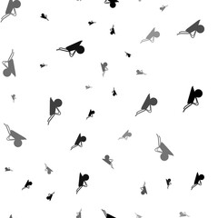 Seamless vector pattern with garden wheelbarrow symbols, creating a creative monochrome background with rotated elements. Illustration on transparent background