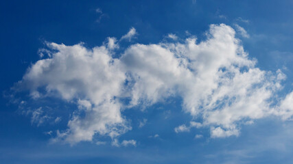 Naklejka na ściany i meble Blue sky background with tiny clouds. Cloudscape - Blue sky and white clouds. Clouds with blue sky