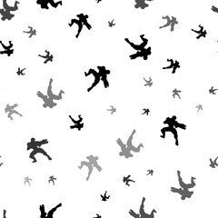 Seamless vector pattern with combat robots, creating a creative monochrome background with rotated elements. Vector illustration on white background