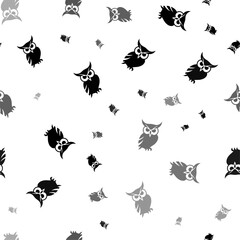 Seamless vector pattern with owl symbols, creating a creative monochrome background with rotated elements. Vector illustration on white background