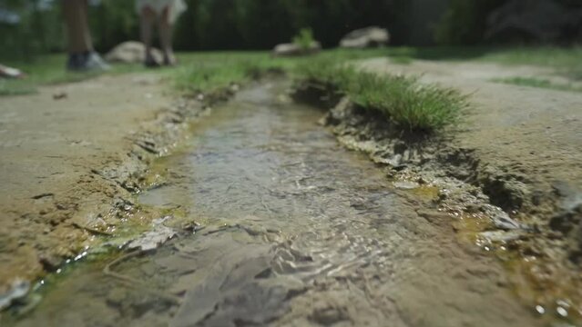 Following the flow of the crsytal clear, clean mineral waters found in the church yard of St. Petka church, near the town of Rupite, Petrich in Bulgaria.