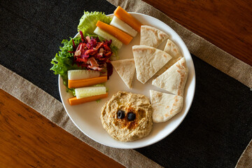 Hummus and pita bread - 680407223
