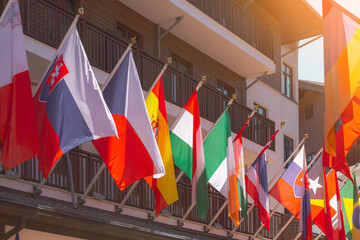 Flags of countries hanging on a flagpole, international conference, business forum meeting