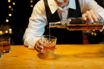 Bartender Serve Whiskey, on wood bar, 