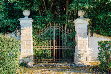 Wrought iron gate, park entrance. - 680423064