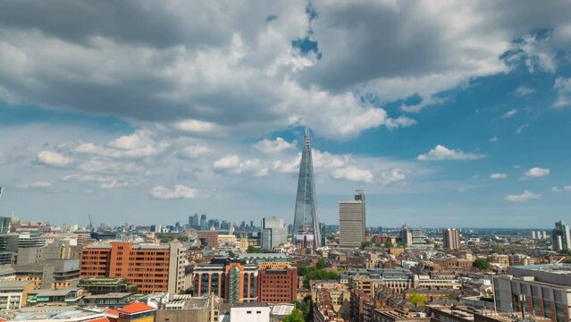 A spectacular hyperlapse of The Shard and Central London on a sunny day with patchy clouds standing 309.7 meters high