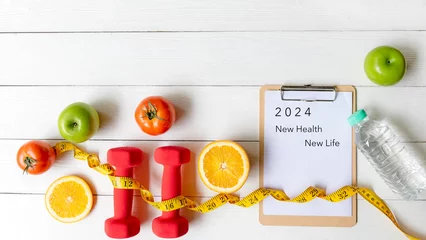 Poster 2024 NEW HEALTH AND NEW LIFE.  New year for New Changes Healthy.  Fresh vegetable fruits and healthy food for sport equipment for women diet slimming weight loss on white wood.  Healthy and Holiday © freebird7977