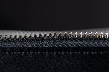 Fotobehang zipper on a black women's handbag close-up © rsooll