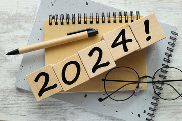2024. beautiful picture of different notebooks. New year coming. business concept