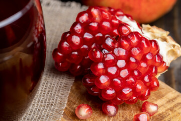 Red pomegranate ripe and lying on the table