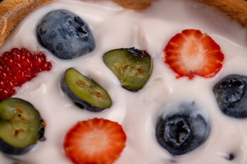 ripe blueberry berries and yogurt with blueberry and blueberry flavor