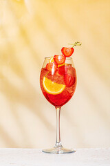 strawberry cocktail with orange and ice