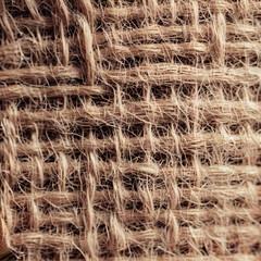 Rough burlap texture Close-up Natural beige tone Ideal for creating a rustic or organic design