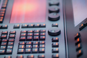 Close-up of a sound mixer control panel. Selective focus.