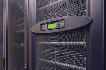 An emergency situation has arisen in the server room as the UPS module battery alarm is indicating a problem with the electricity supply.