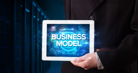 Business model tablet concept blue background