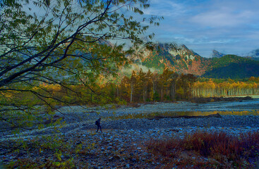 Kamikochi National Park in the Northern Japan Alps of Nagano Prefecture, Japan. Beautiful mountain in autumn leaf and Azusa river